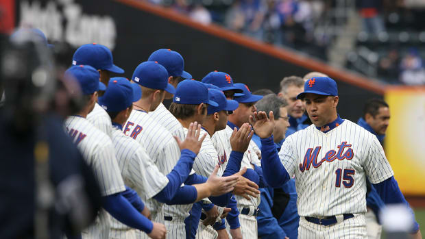 Mets home opener vs. Washington Nationals. (right) NY Mets #15 Carlos Beltran takes the field during the opening ceremonies before the start of the game. Beltran 1